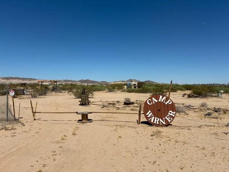 The hand-painted Camp Warner entrance sign