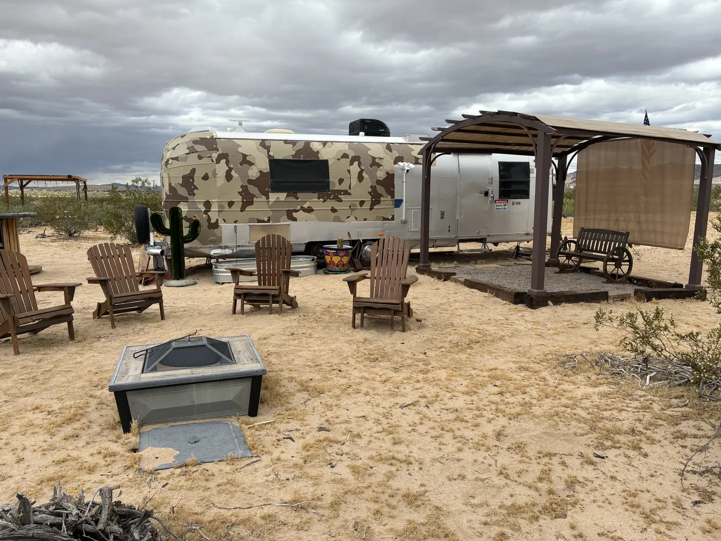 Shared pergola and fire pit at Camp Warner